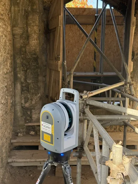 Trimble X9 laser scanner inside a scaffolded listed building